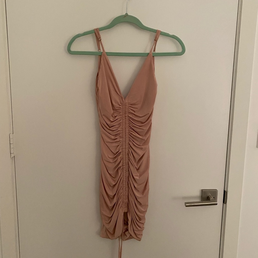 Blush pink tie front dress.